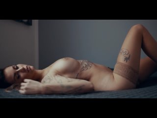 brunette tempers big breasts and puts on stockings on beautiful legs (erotica, sex, beautiful girl, vulgar model, striptease)